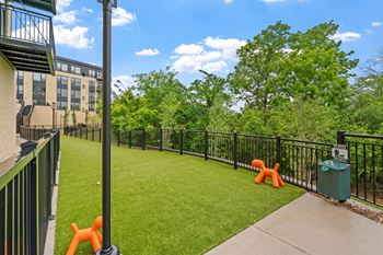 The outdoor gated pet run at Lilia Apartments in Lilydale, MN 55118